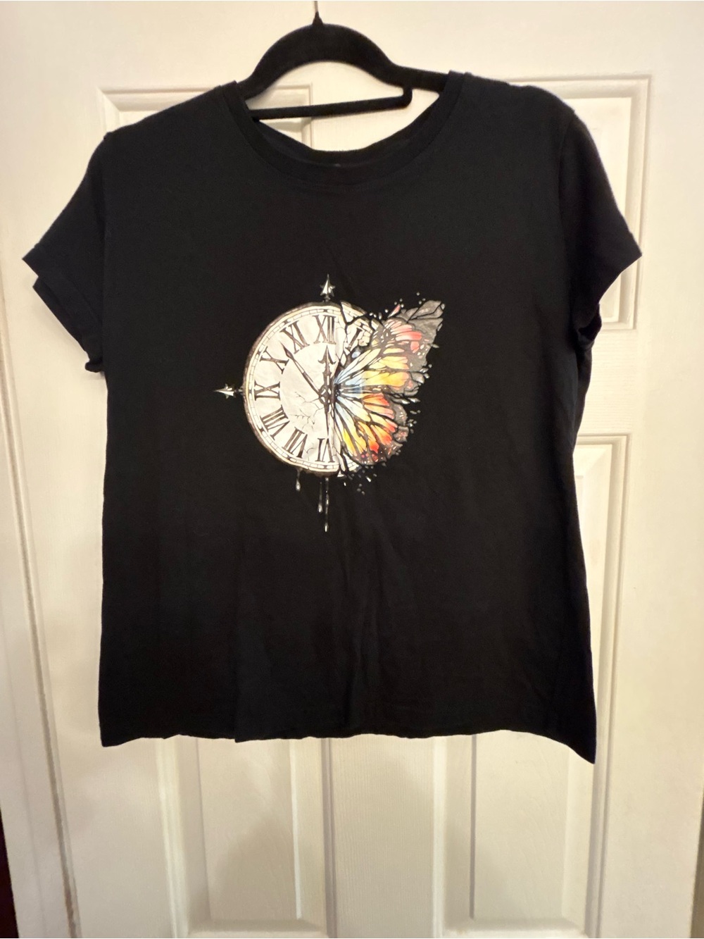 Women’s Shein Butterfly/clock black shirt size extra large.